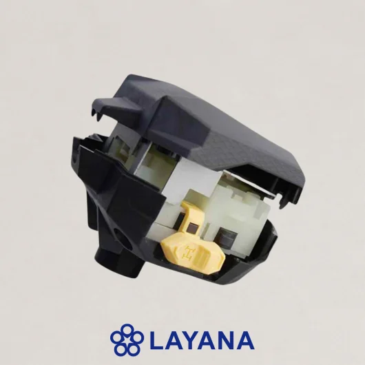 Plastic and metal automotive subassembly combining moulded housing and precision metal components.